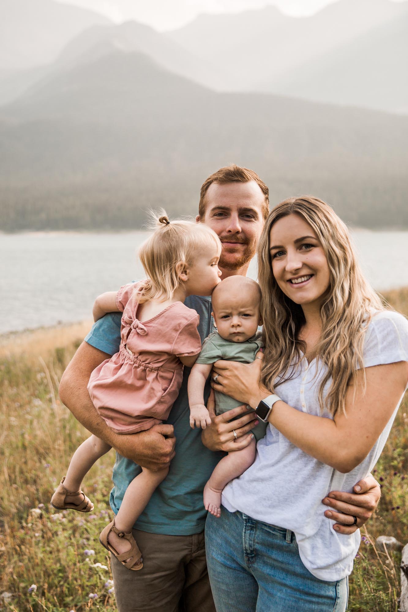Calgary and Kananaskis Country mountains family photographer, a family photo surrounded by mountains