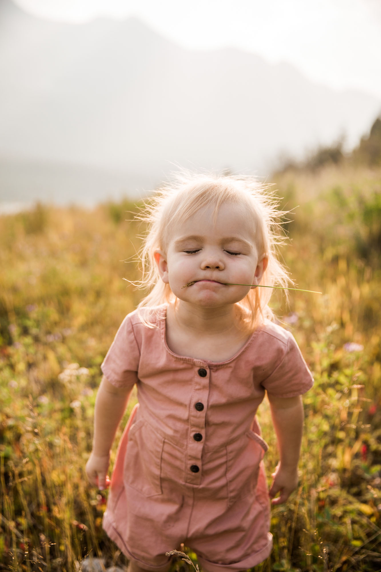 Calgary and Kananaskis Country mountains family photographer, a family photo surrounded by mountains
