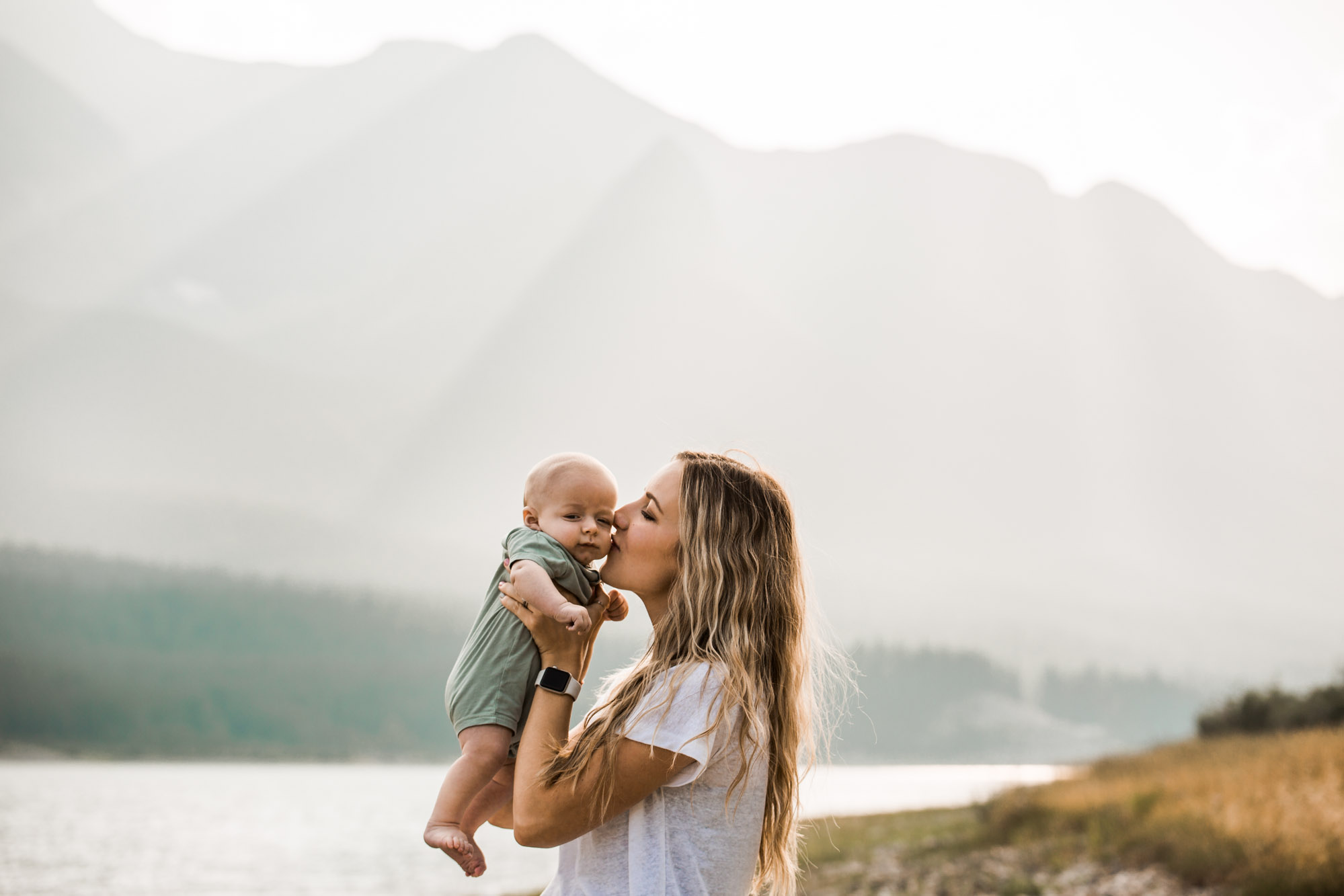 Calgary and Kananaskis Country mountains family photographer, a family photo surrounded by mountains