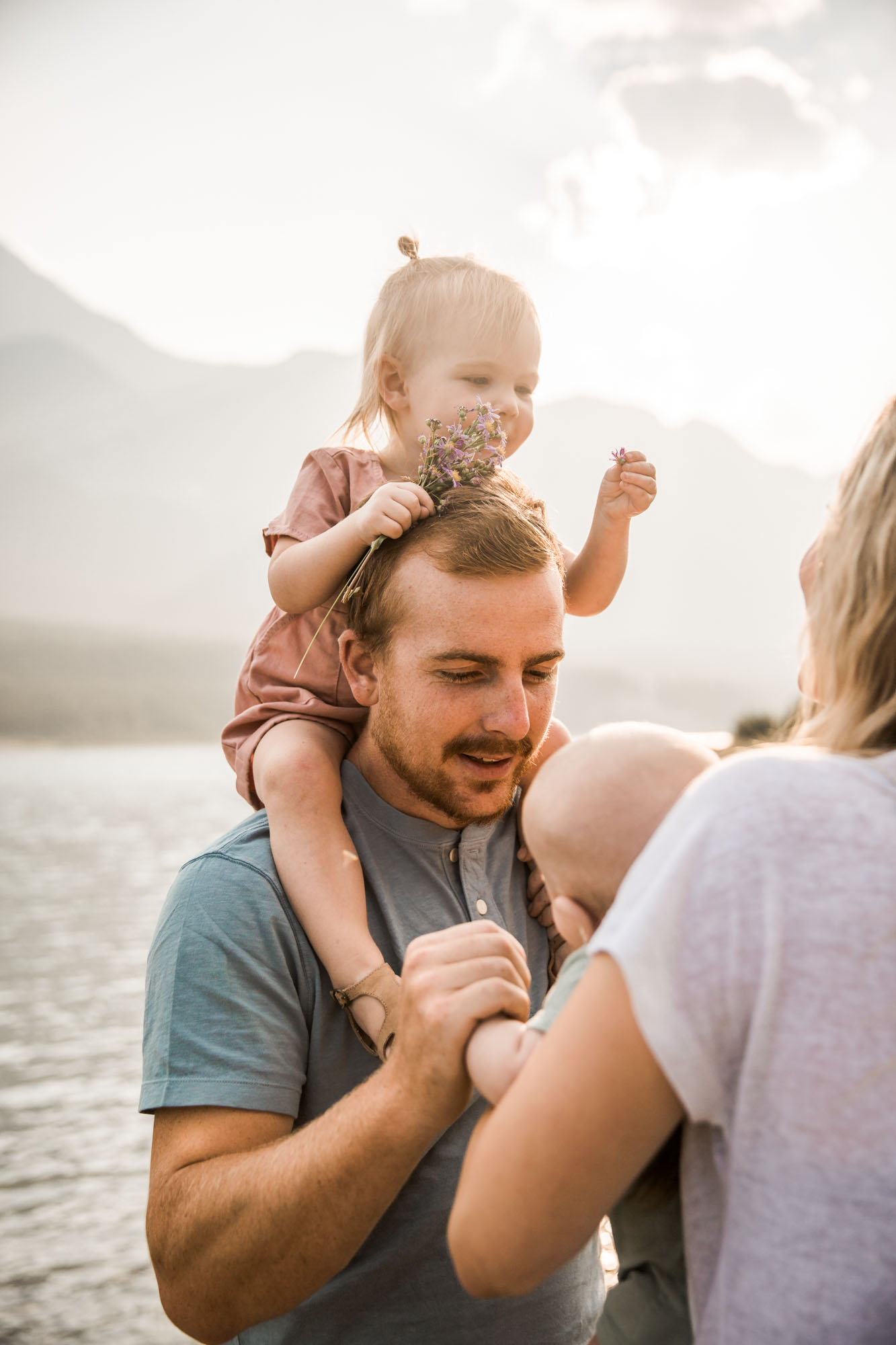 Calgary and Kananaskis Country mountains family photographer, a family photo surrounded by mountains