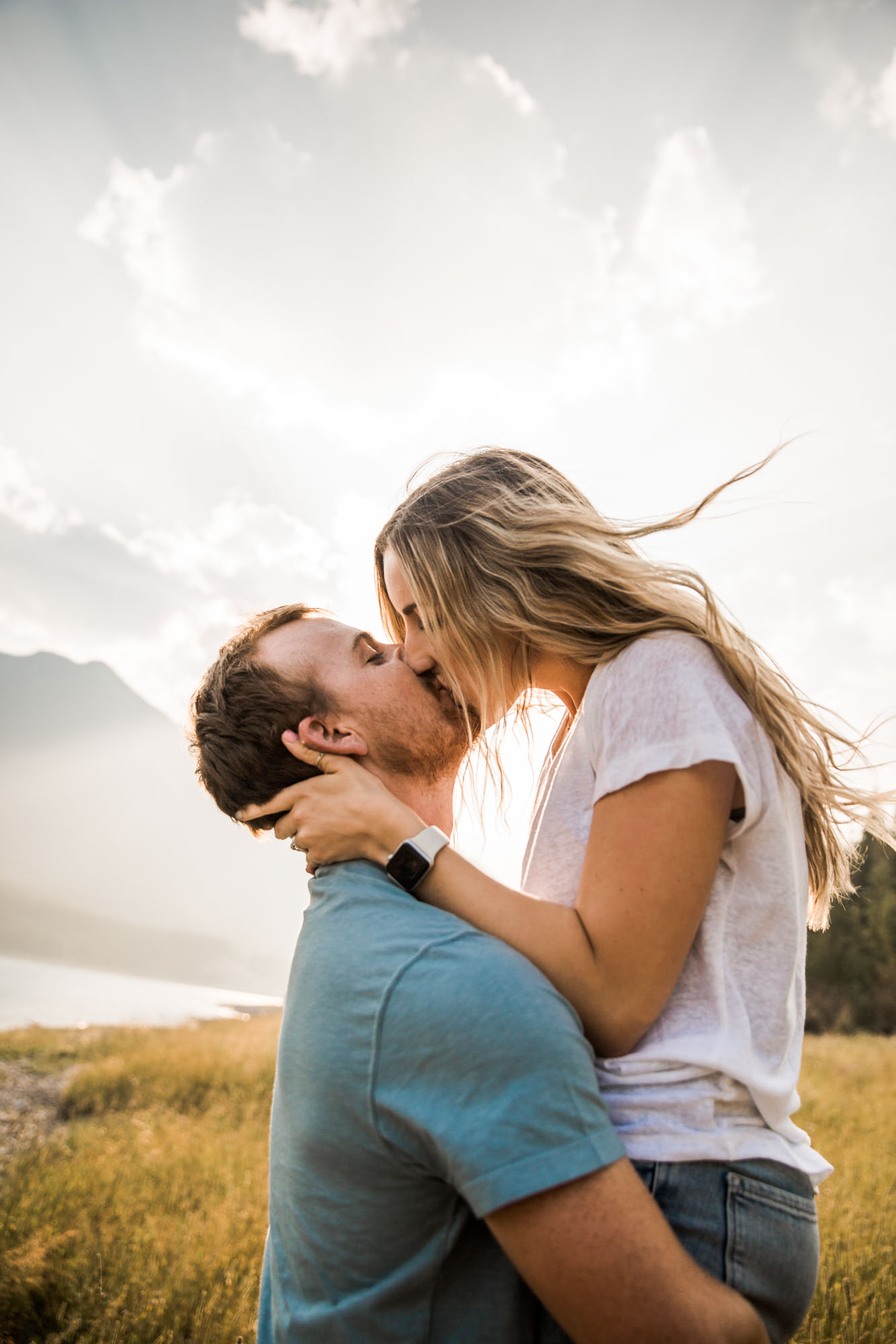 Calgary and Kananaskis Country mountains family photographer, a family photo surrounded by mountains