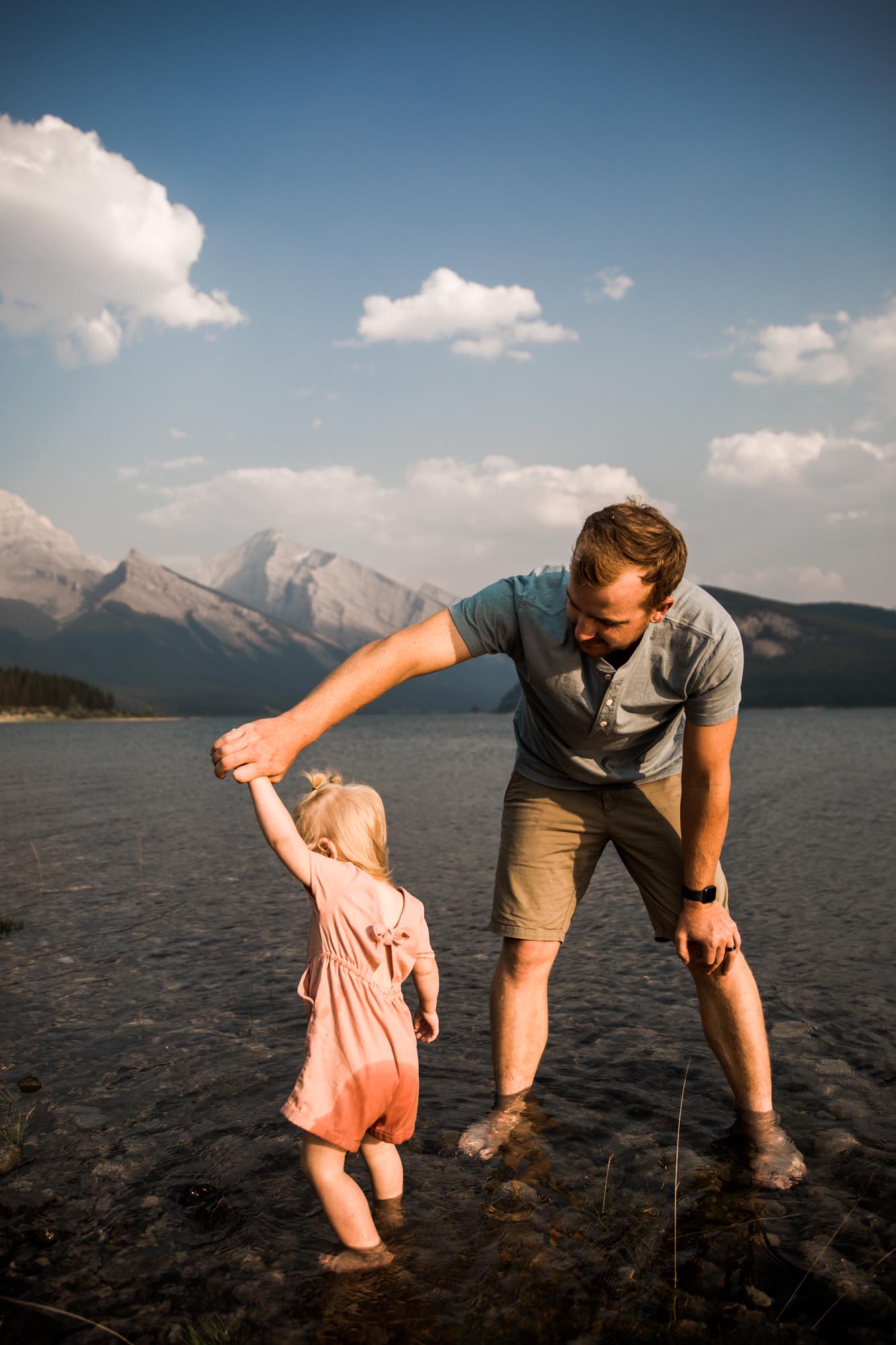 Calgary and Kananaskis Country mountains family photographer, a family photo surrounded by mountains
