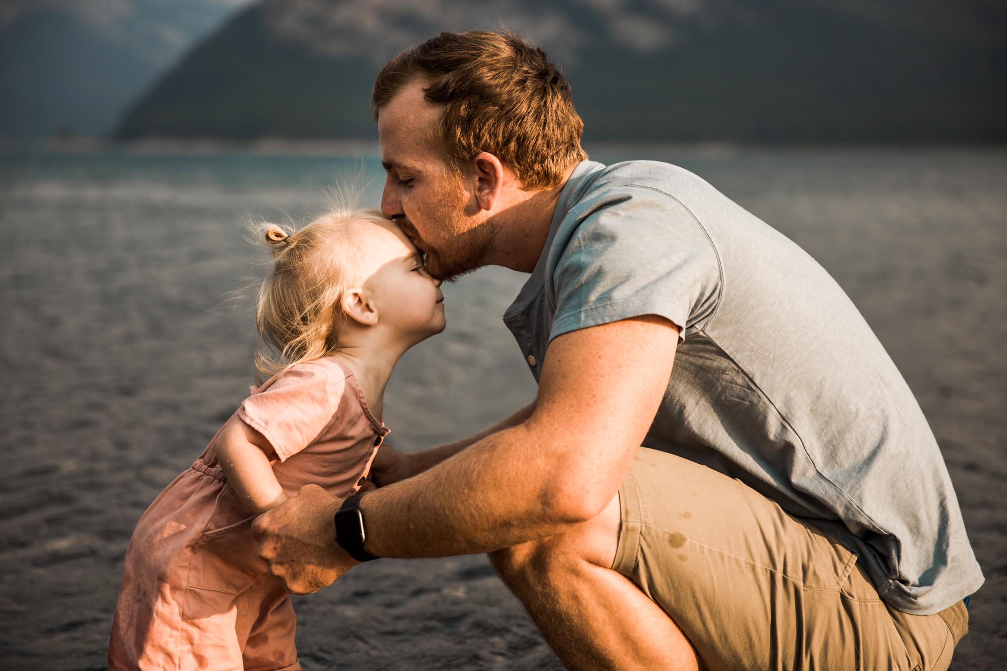 Calgary and Kananaskis Country mountains family photographer, a family photo surrounded by mountains