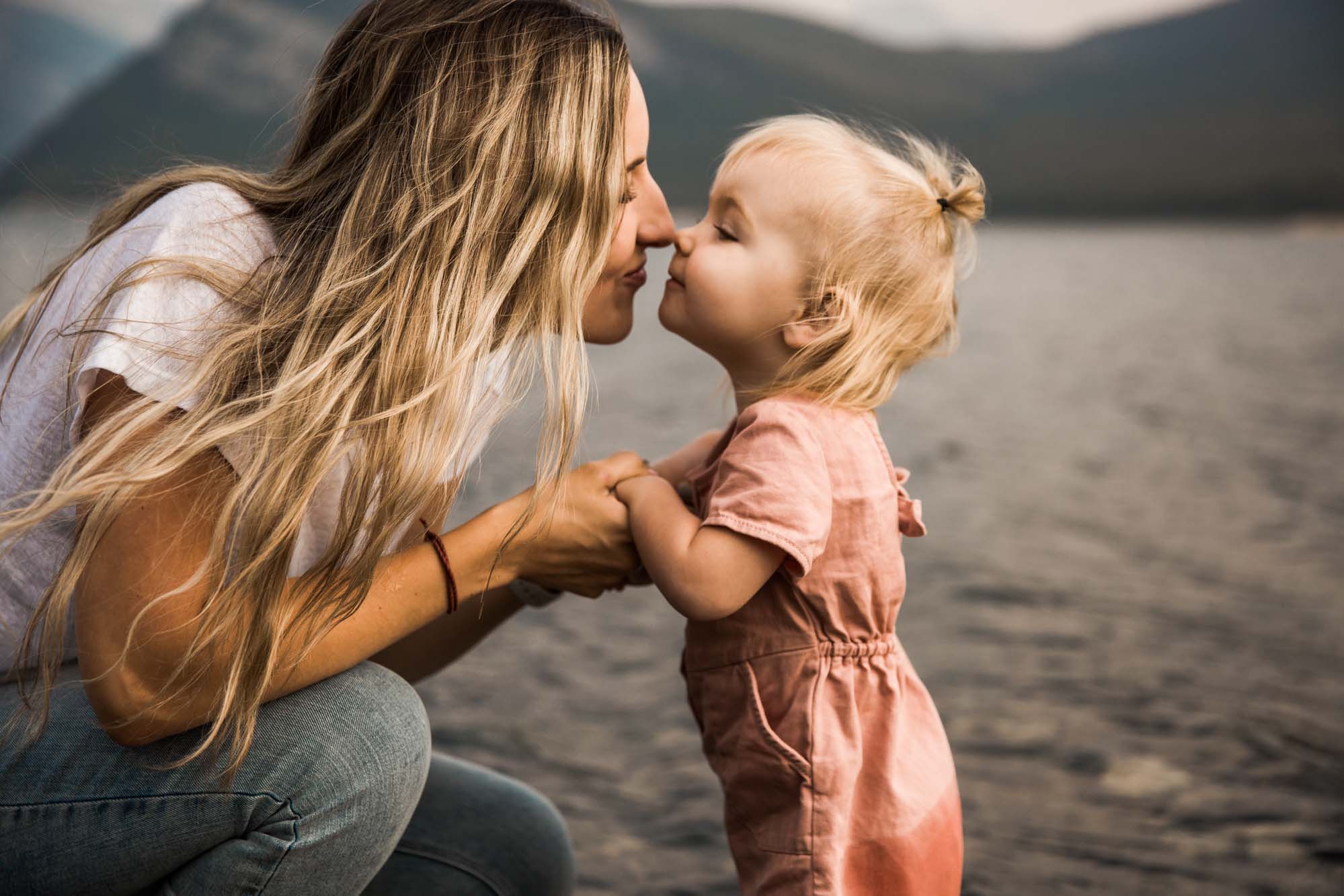 Calgary lifestyle family photographer, family photos by the water at sunset in Kananaskis Country