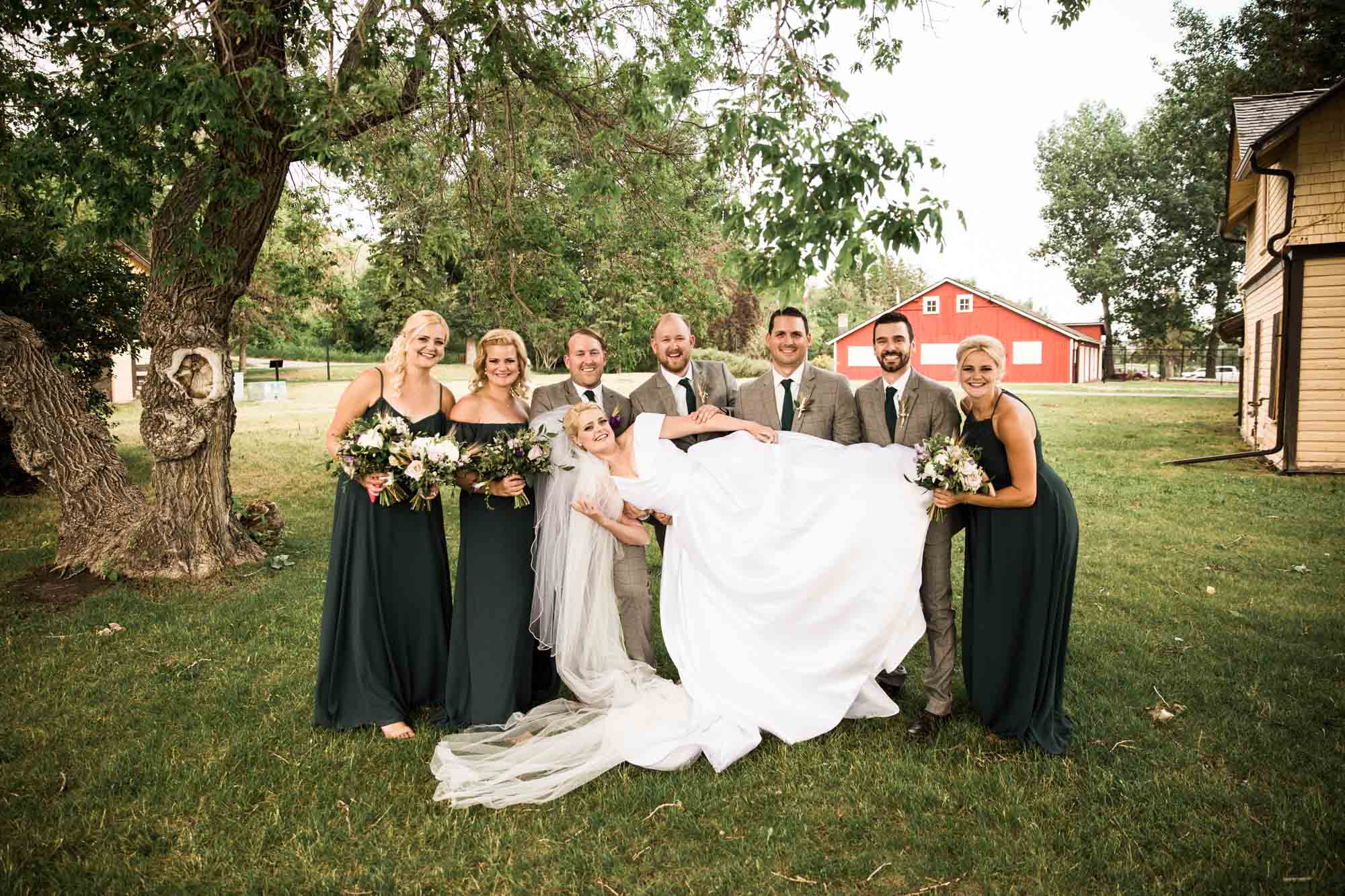 Calgary wedding photographer, portrait of the bridal party at Fish Creek Park