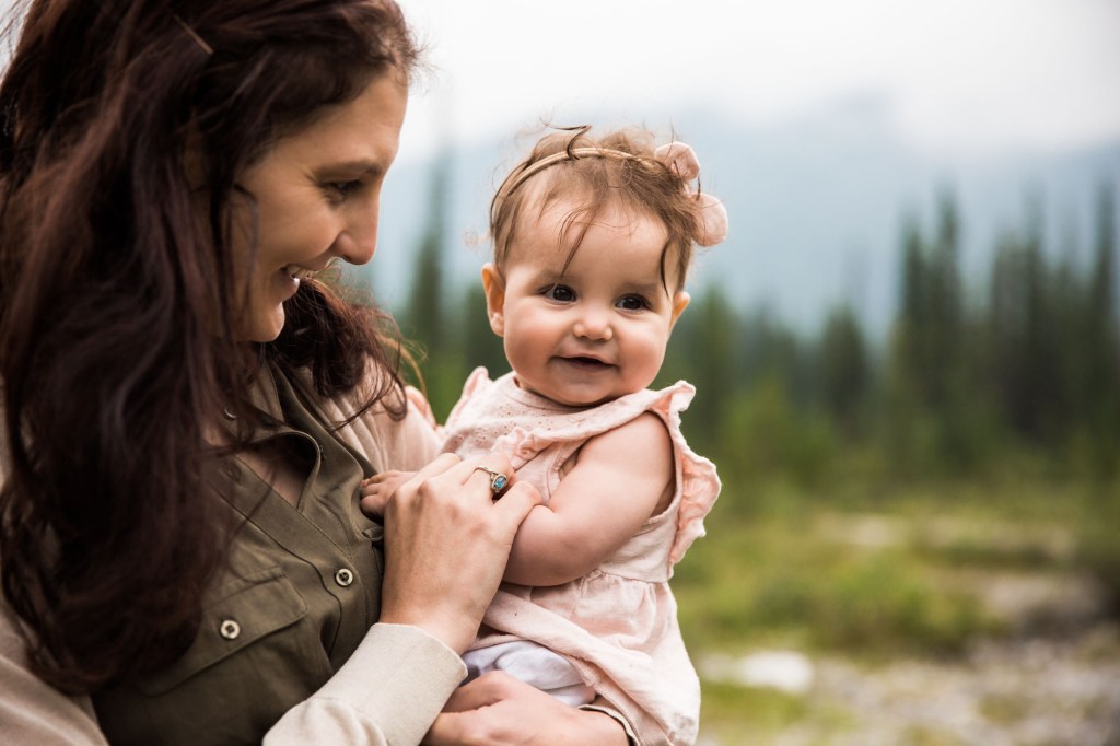Calgary family photographer, mountain photos, family by the water in the Kananaskis