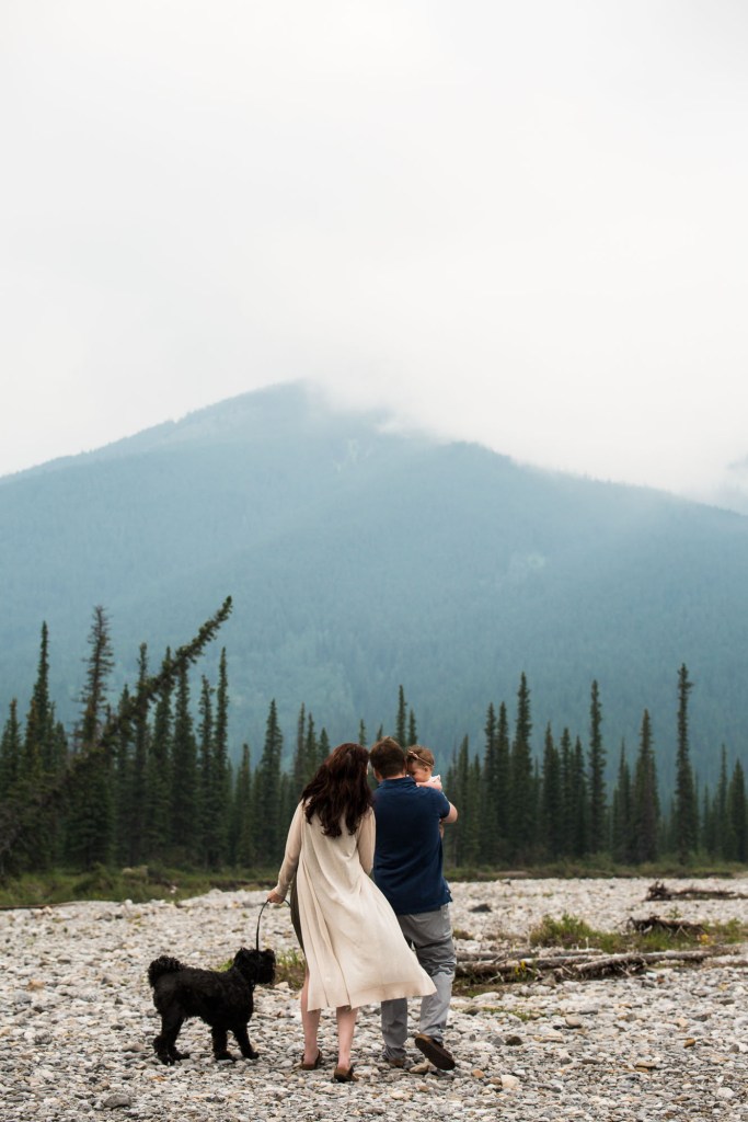 Calgary family photographer, mountain photos, family by the water in the Kananaskis