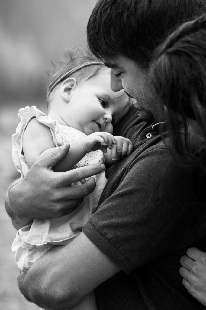 Calgary family photographer, mountain photos, family by the water in the Kananaskis