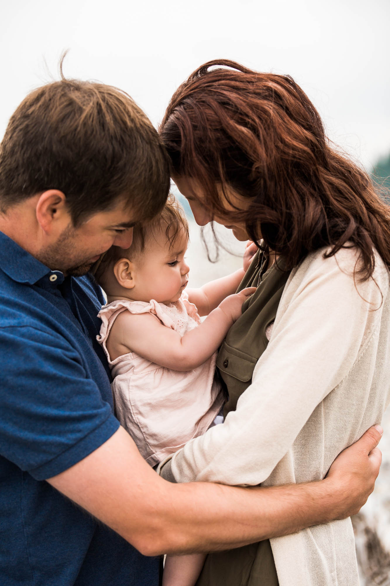 Calgary family photographer, mountain photos, family by the water in the Kananaskis