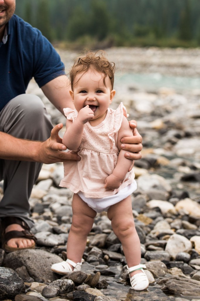 Calgary family photographer, mountain photos, family by the water in the Kananaskis
