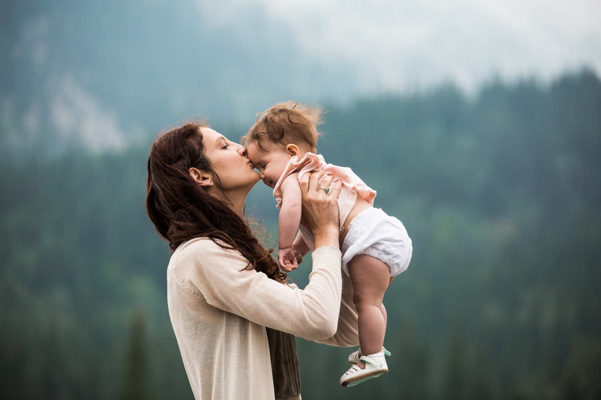 Calgary family photographer, mountain photos, family by the water in the Kananaskis