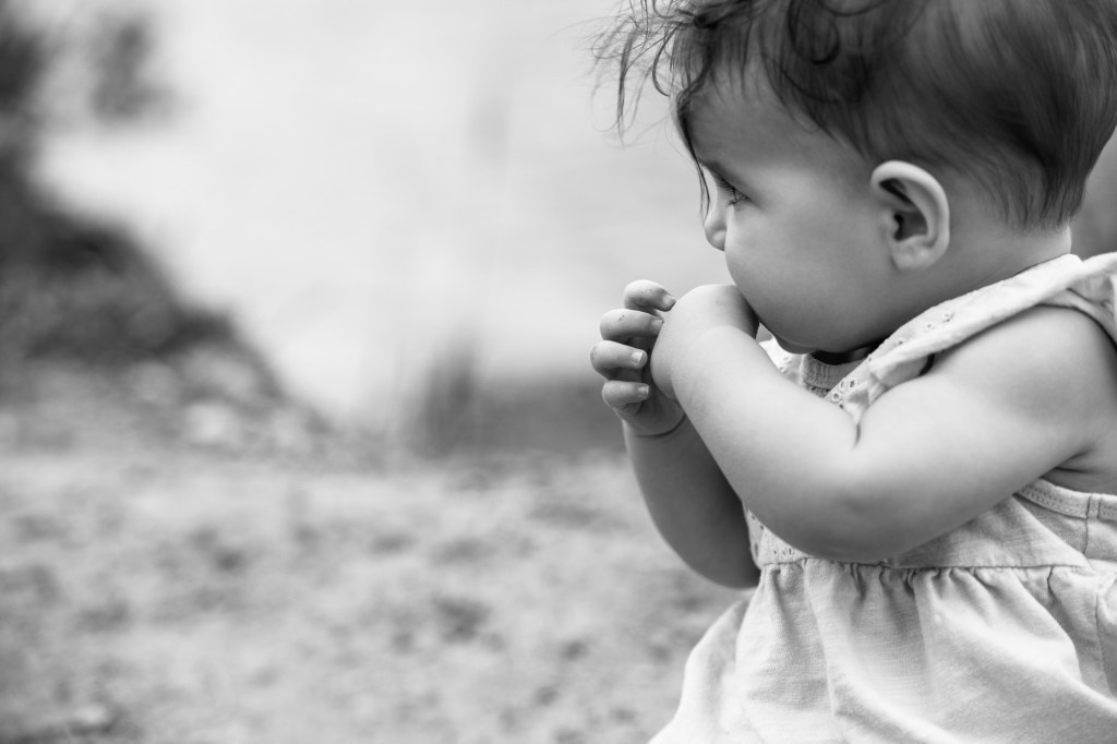 Calgary family photographer, mountain photos, family by the water in the Kananaskis