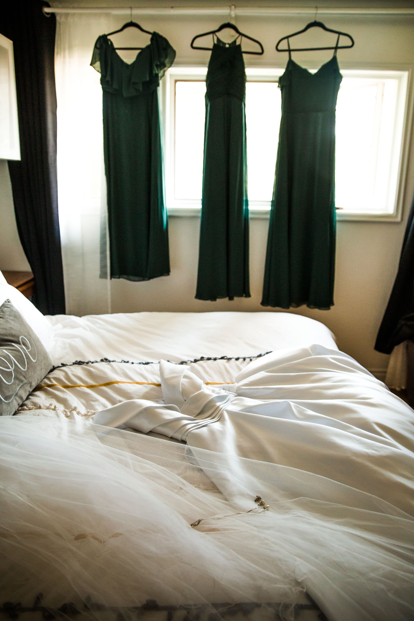 Calgary wedding photographer, the bride and groom getting ready for their wedding ceremony