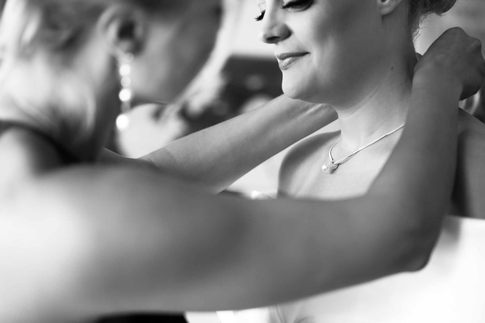 Calgary wedding photographer, the bride and groom getting ready for their wedding ceremony