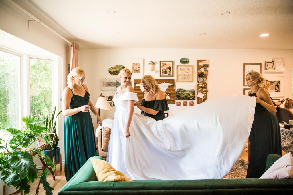 Calgary wedding photographer, the bride and groom getting ready for their wedding ceremony