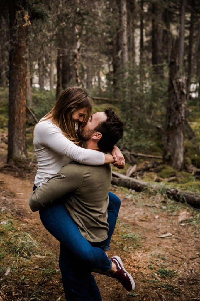 Calgary wedding and engagement photographer, couple in the mountains for adventure engement photos in Kananaskis Country