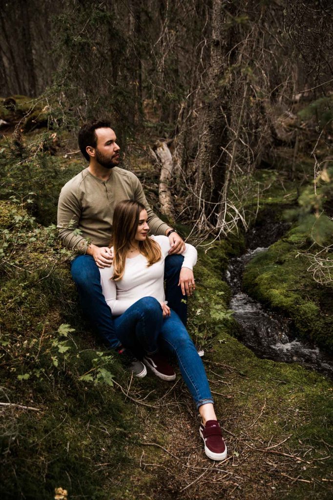 Calgary wedding and engagement photographer, couple in the mountains for adventure engement photos in Kananaskis Country