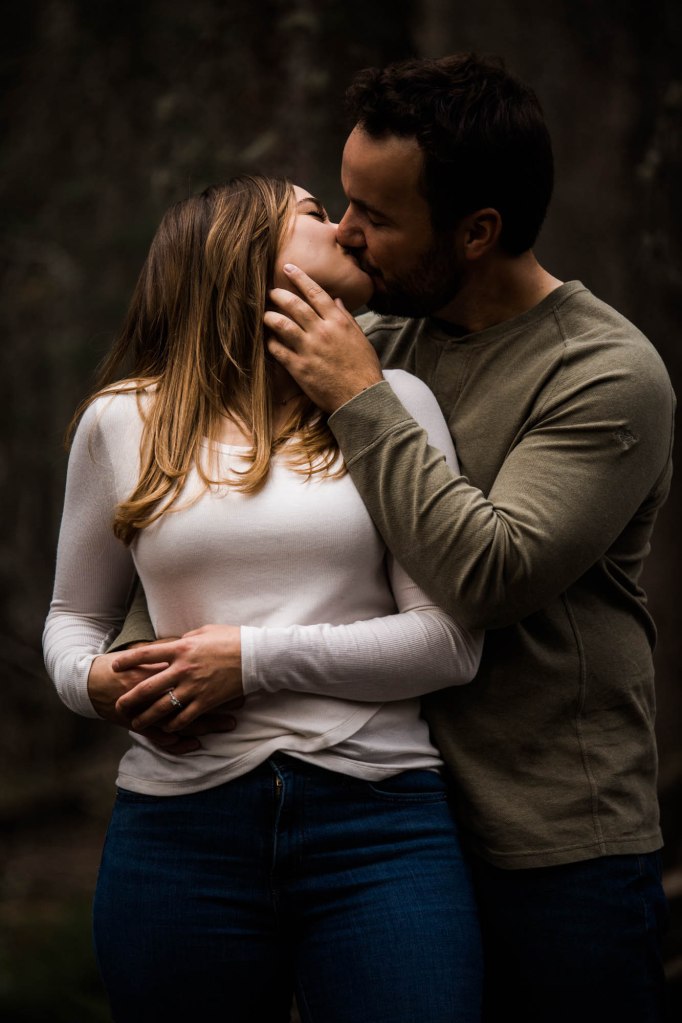 Calgary wedding and engagement photographer, couple in the mountains for adventure engement photos in Kananaskis Country