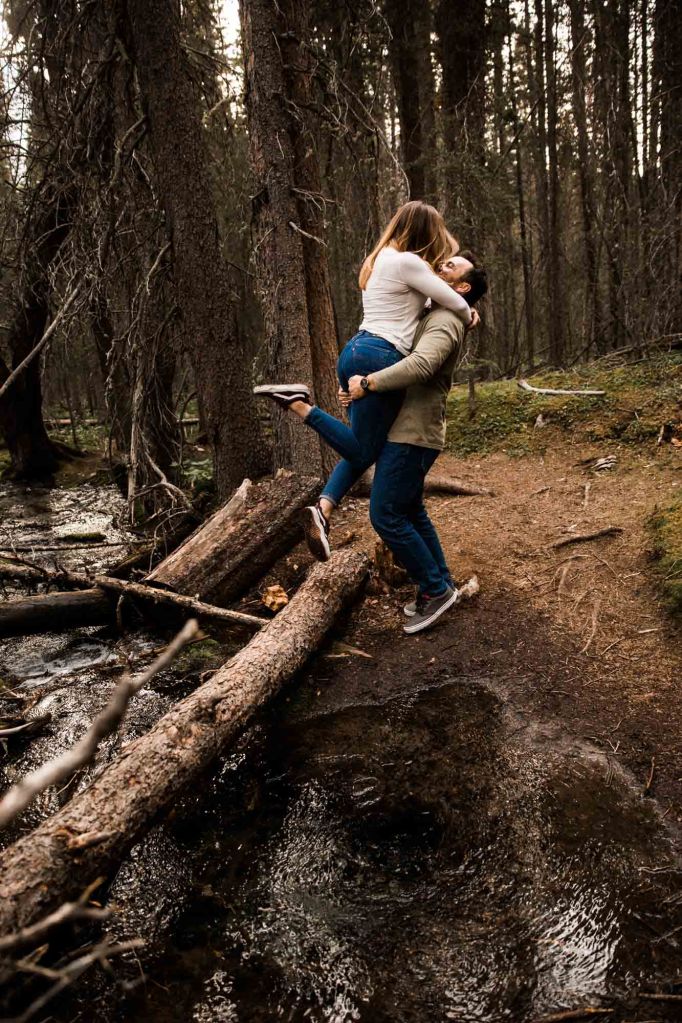 Calgary wedding and engagement photographer, couple in the mountains for adventure engement photos in Kananaskis Country