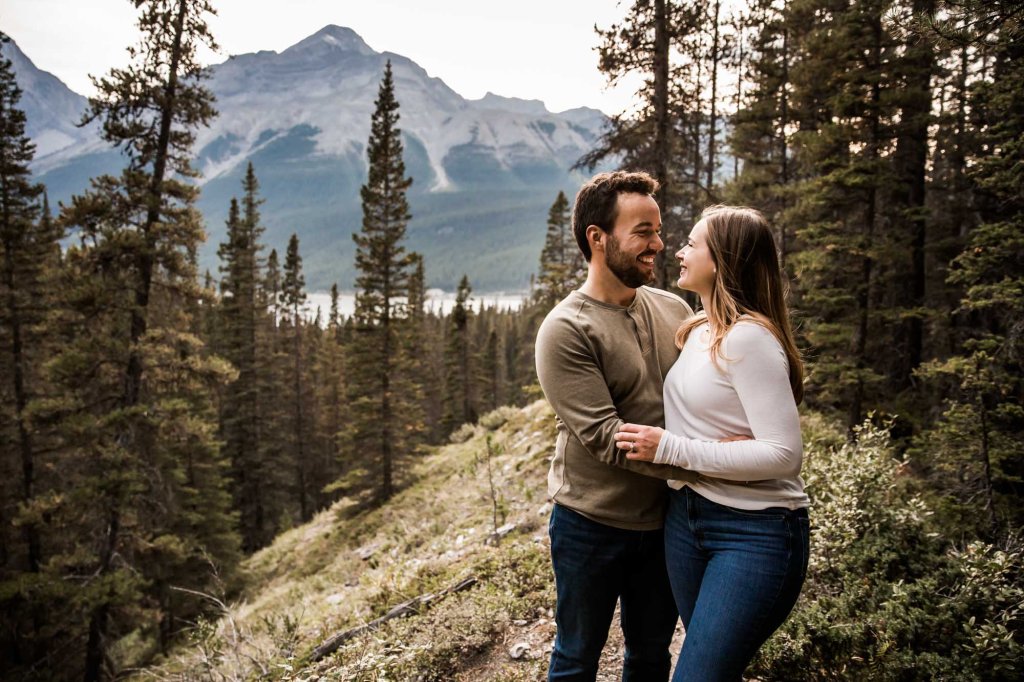 Calgary wedding and engagement photographer, couple in the mountains for adventure engement photos in Kananaskis Country