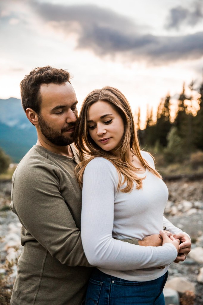 Calgary wedding and engagement photographer, couple in the mountains for adventure engement photos in Kananaskis Country