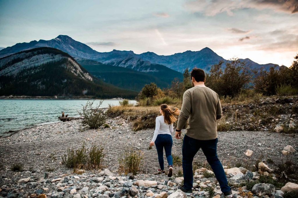 Calgary wedding and engagement photographer, couple in the mountains for adventure engement photos in Kananaskis Country