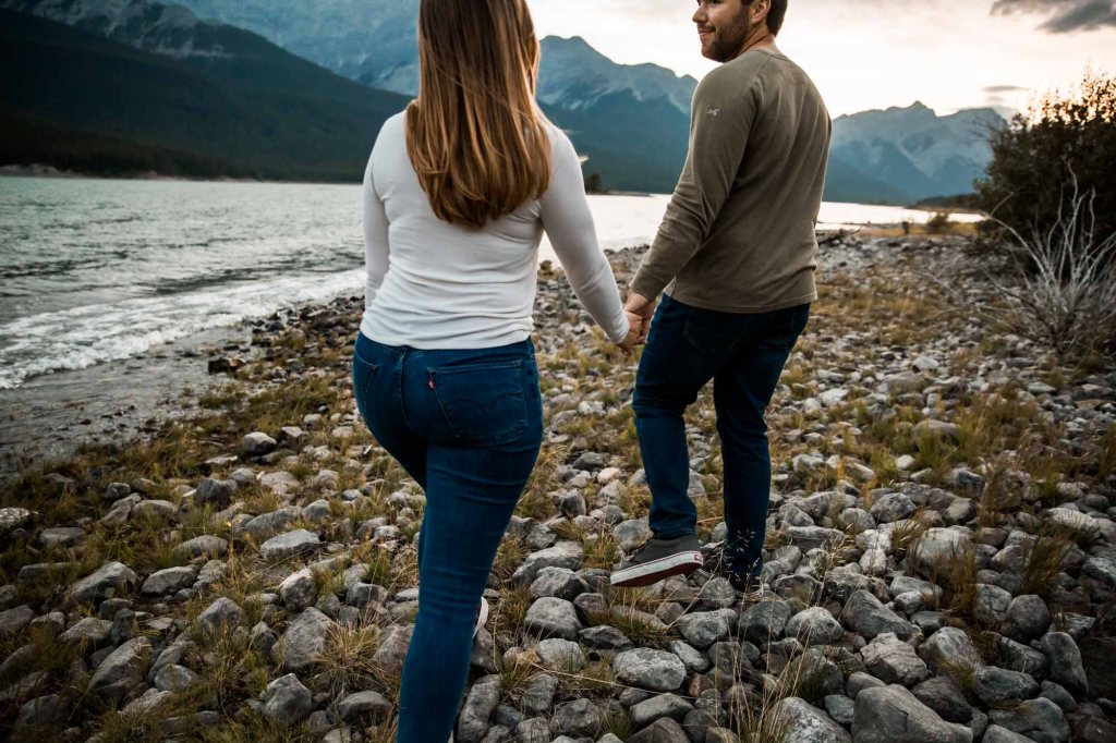 Calgary wedding and engagement photographer, couple in the mountains for adventure engement photos in Kananaskis Country