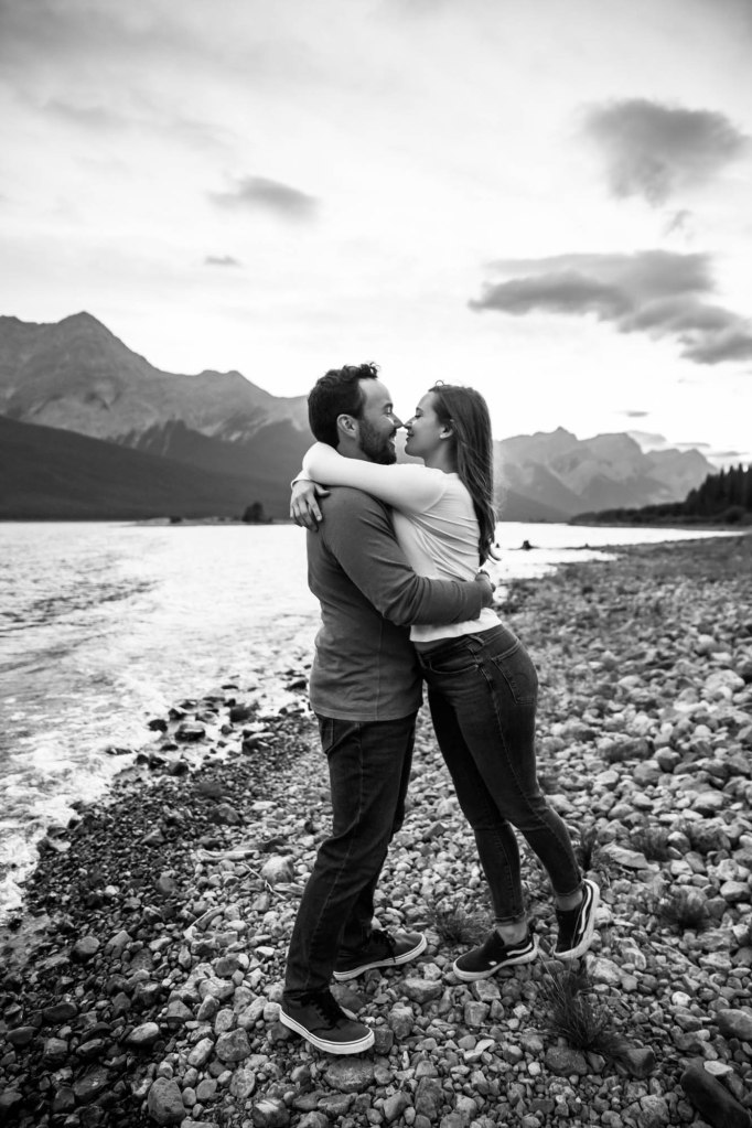 Calgary wedding and engagement photographer, couple in the mountains for adventure engement photos in Kananaskis Country