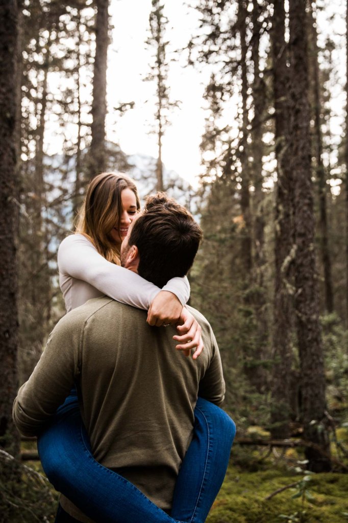 Calgary wedding and engagement photographer, couple in the mountains for adventure engement photos in Kananaskis Country