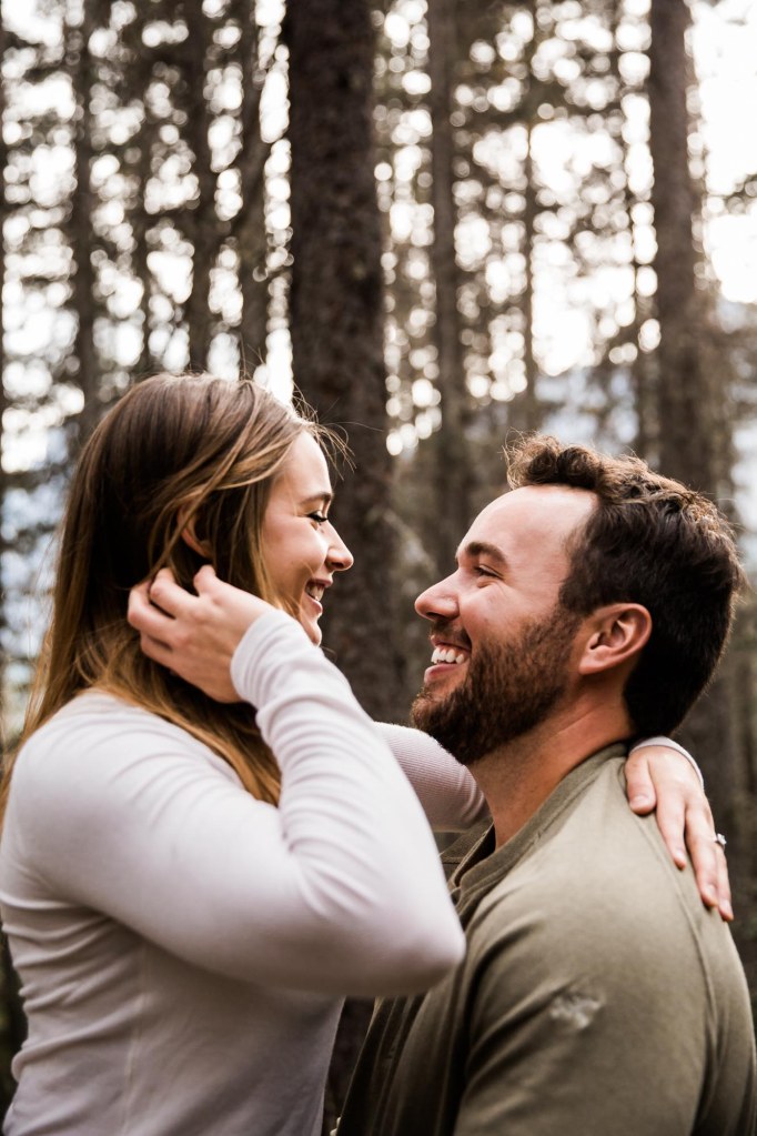 Calgary wedding and engagement photographer, couple in the mountains for adventure engement photos in Kananaskis Country