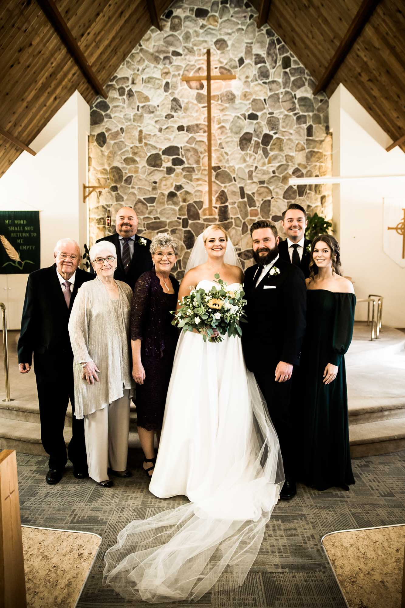 Calgary wedding photographer, bride and groom on their wedding day at a church in Calgary