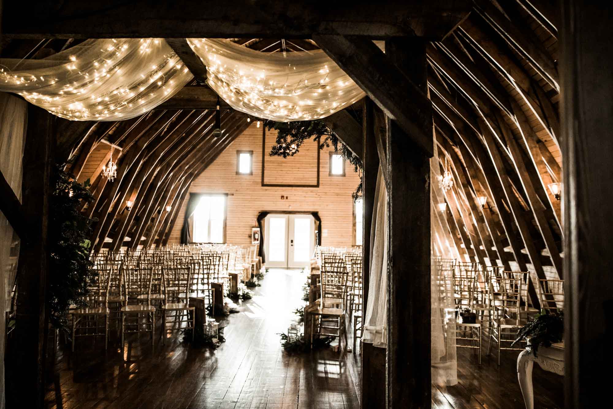 Alberta wedding photographer, wedding at the MVE The Heritage Centre in Cremona, bride and groom during their winter barn wedding