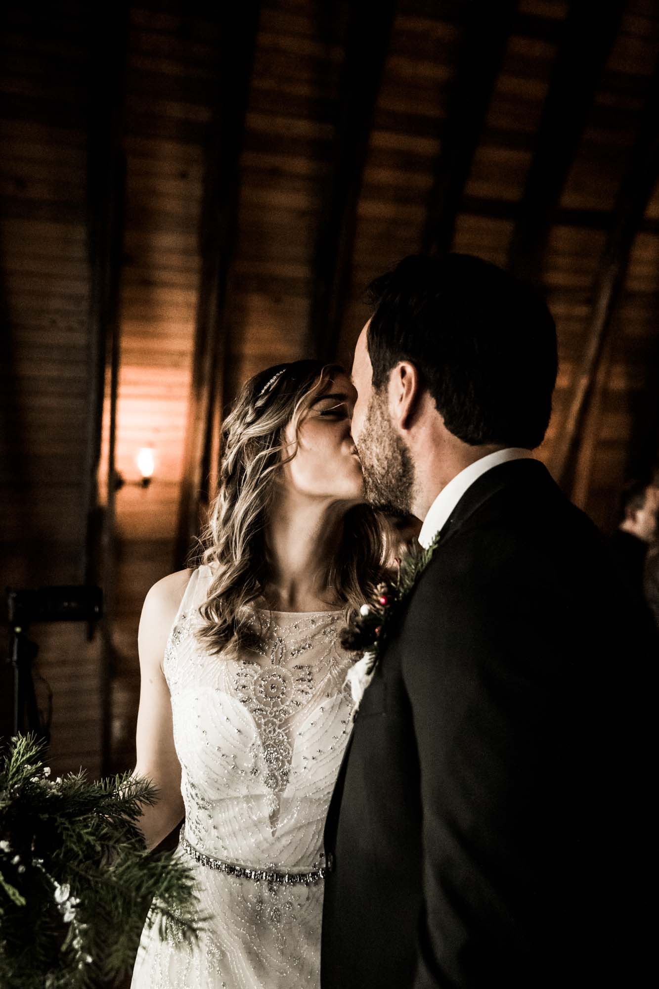 Alberta wedding photographer, wedding at the MVE The Heritage Centre in Cremona, bride and groom during their winter barn wedding