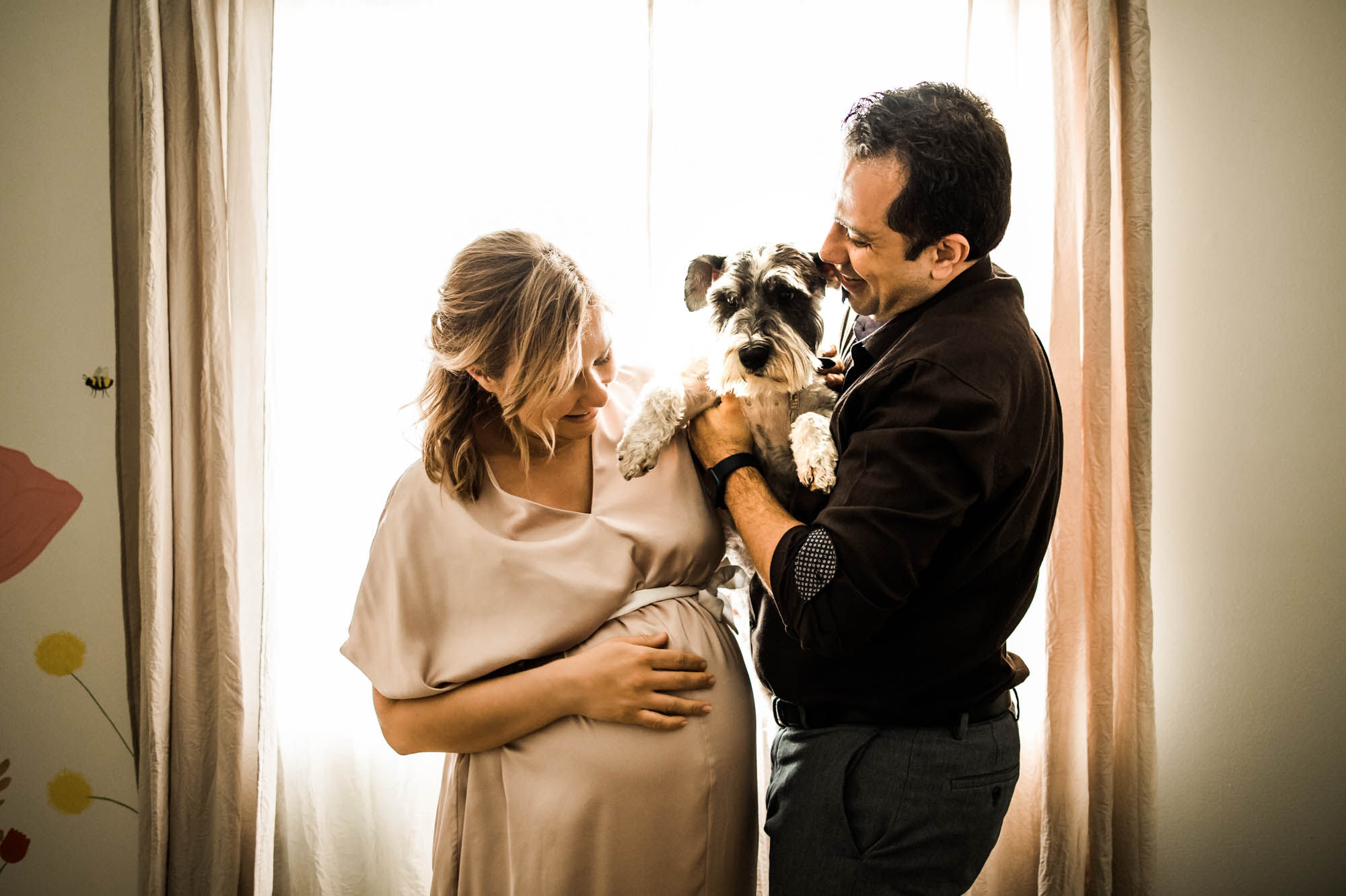 Calgary maternity and newborn photographer, mom with a beautiful pregnant belly in natural window light