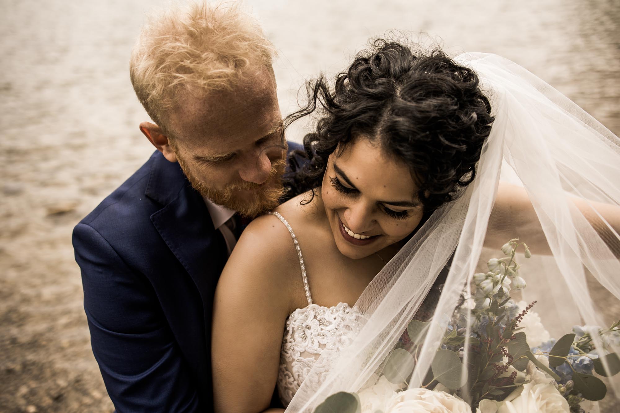 Banff wedding photographer, a couple on their wedding day at the Rimrock, St Mary's Parish in Banff National Park