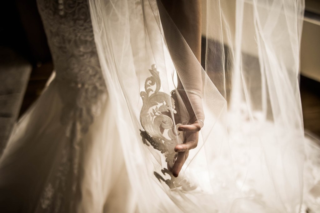 Banff wedding photographer, a couple on their wedding day at the Rimrock, St Mary's Parish in Banff National Park