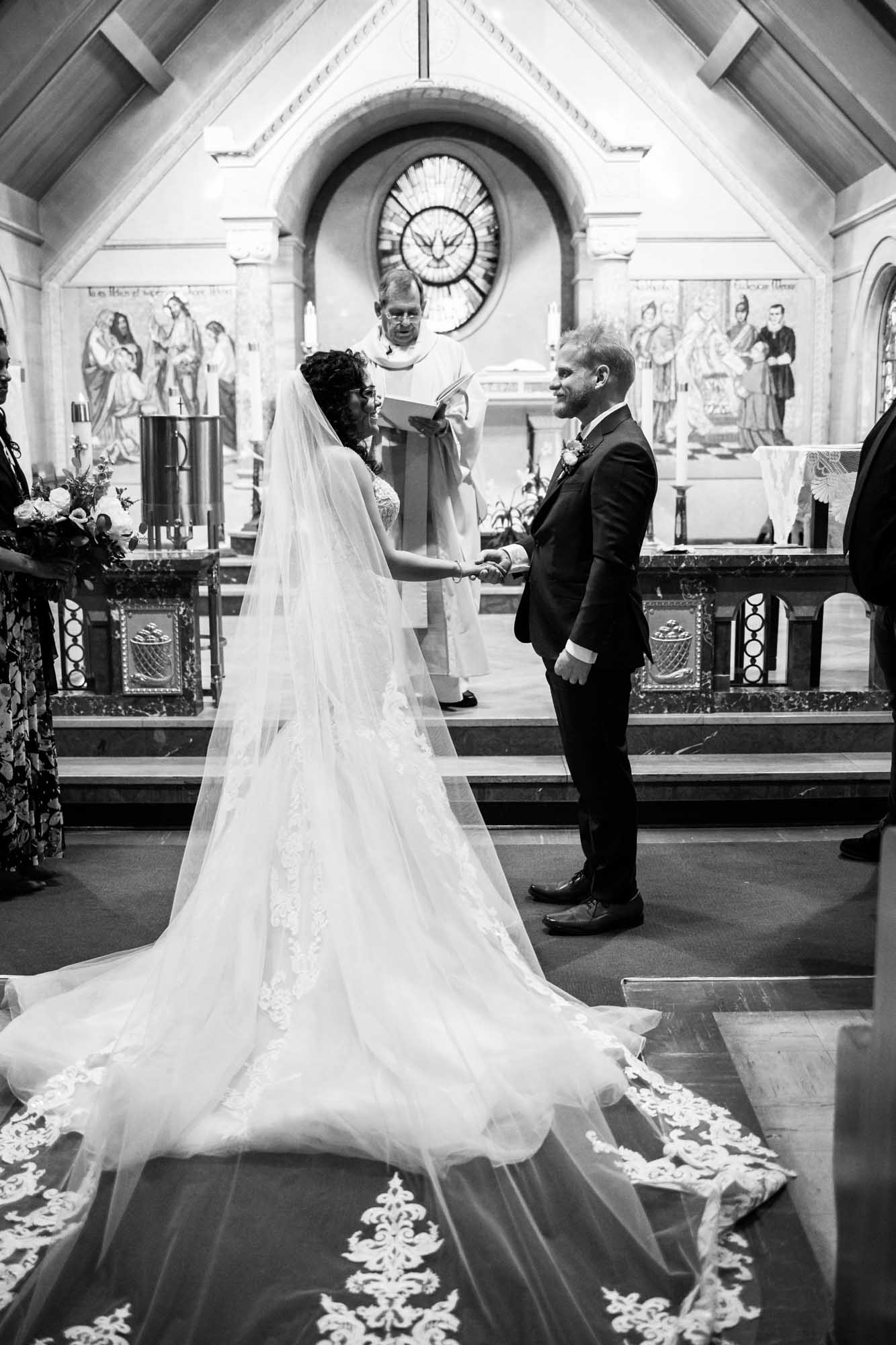 Banff wedding photographer, a couple on their wedding day at the Rimrock, St Mary's Parish in Banff National Park