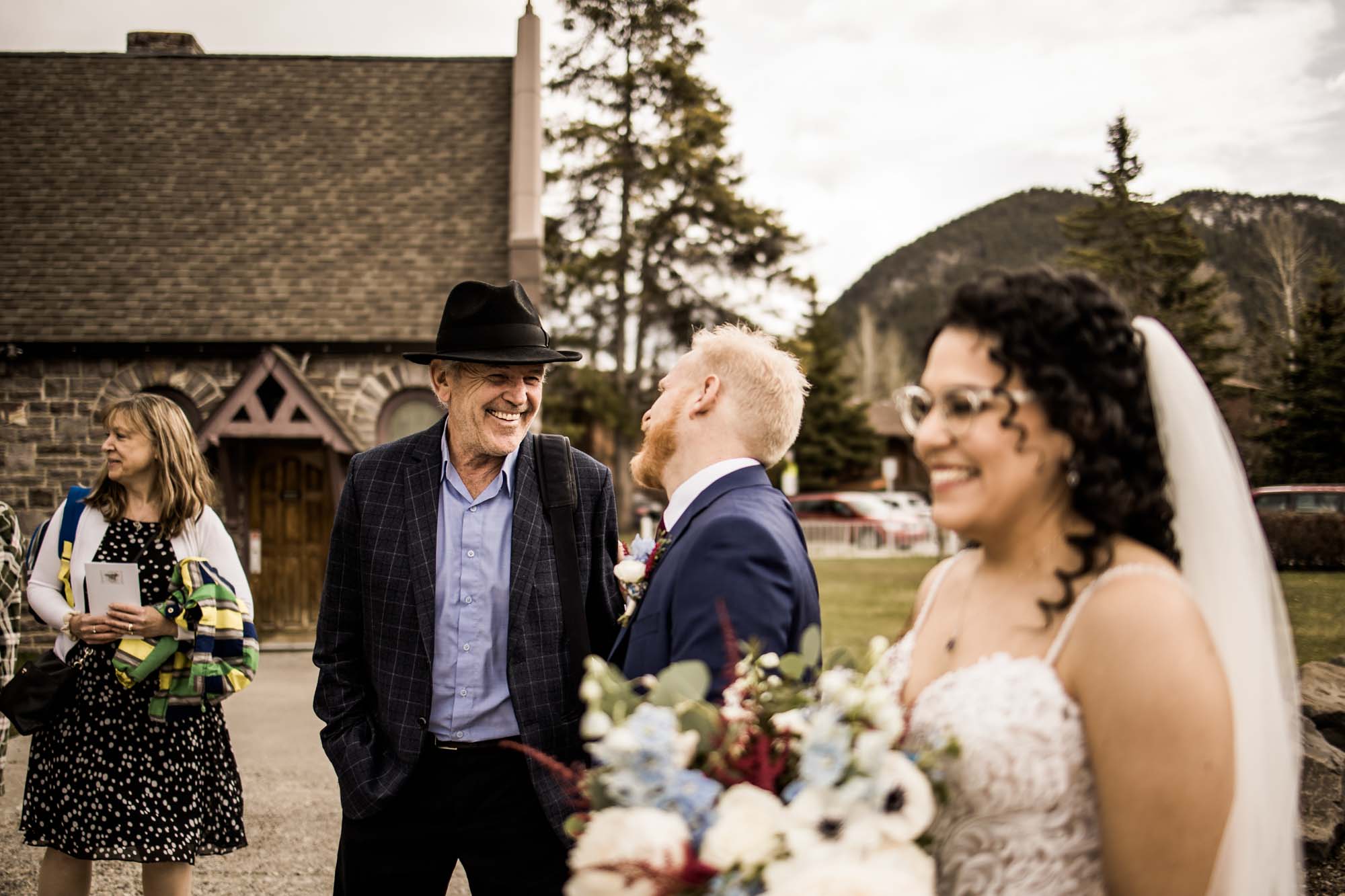 Banff wedding photographer, a couple on their wedding day at the Rimrock, St Mary's Parish in Banff National Park