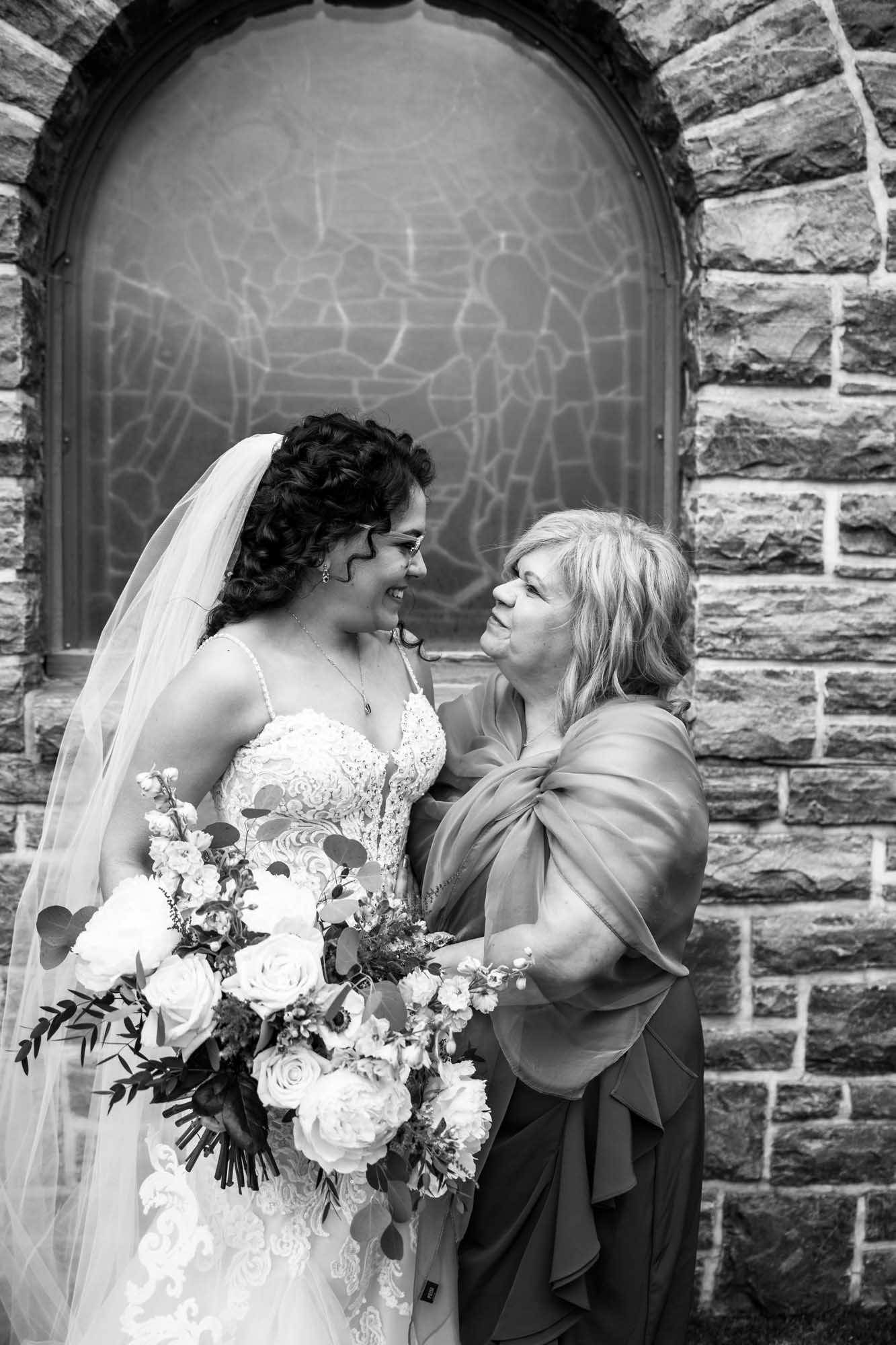 Banff wedding photographer, a couple on their wedding day at the Rimrock, St Mary's Parish in Banff National Park