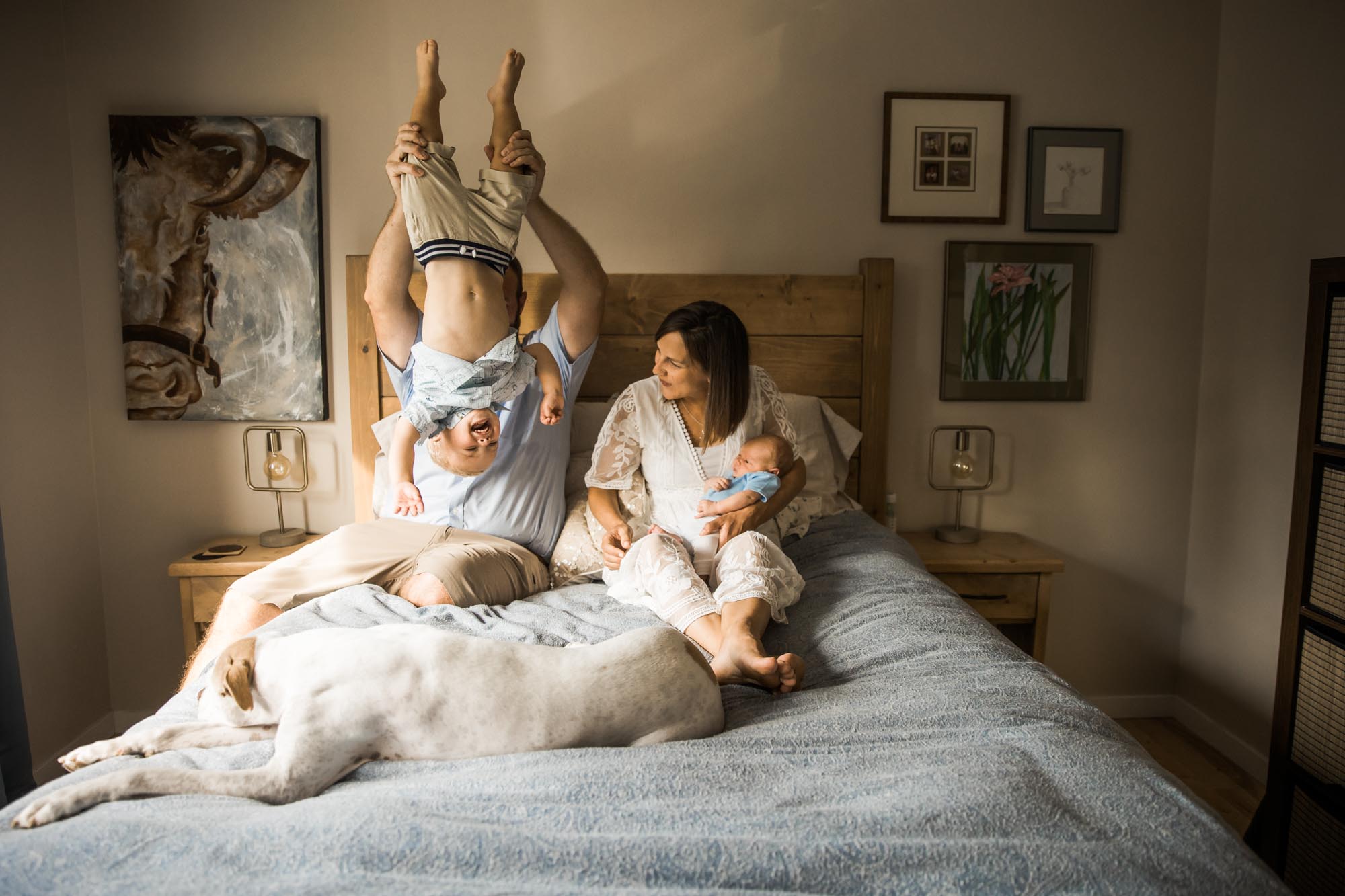 Calgary in-home lifestyle newborn photo of a newborn baby with family