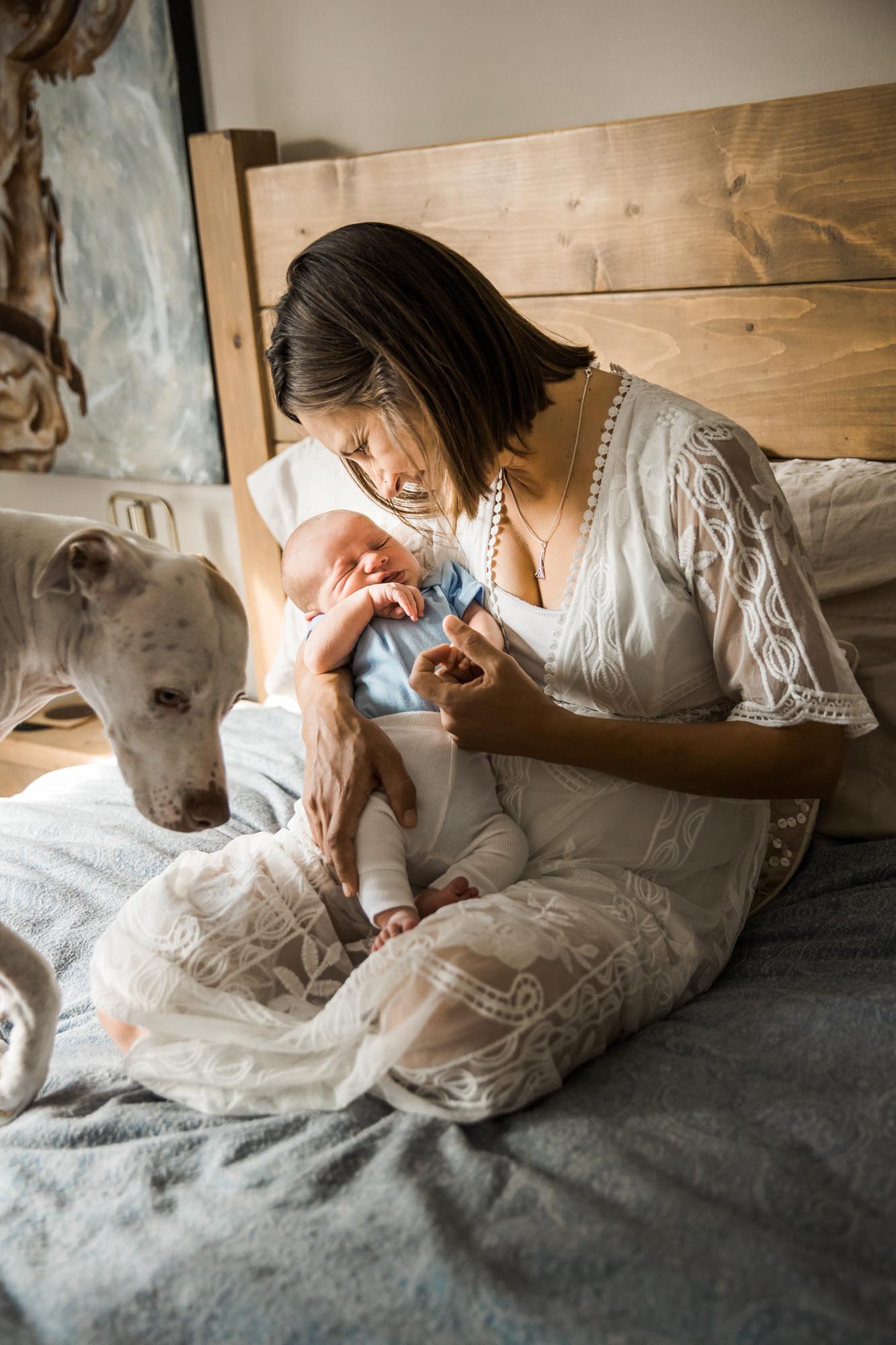 Calgary in-home lifestyle newborn photo of a newborn baby with family