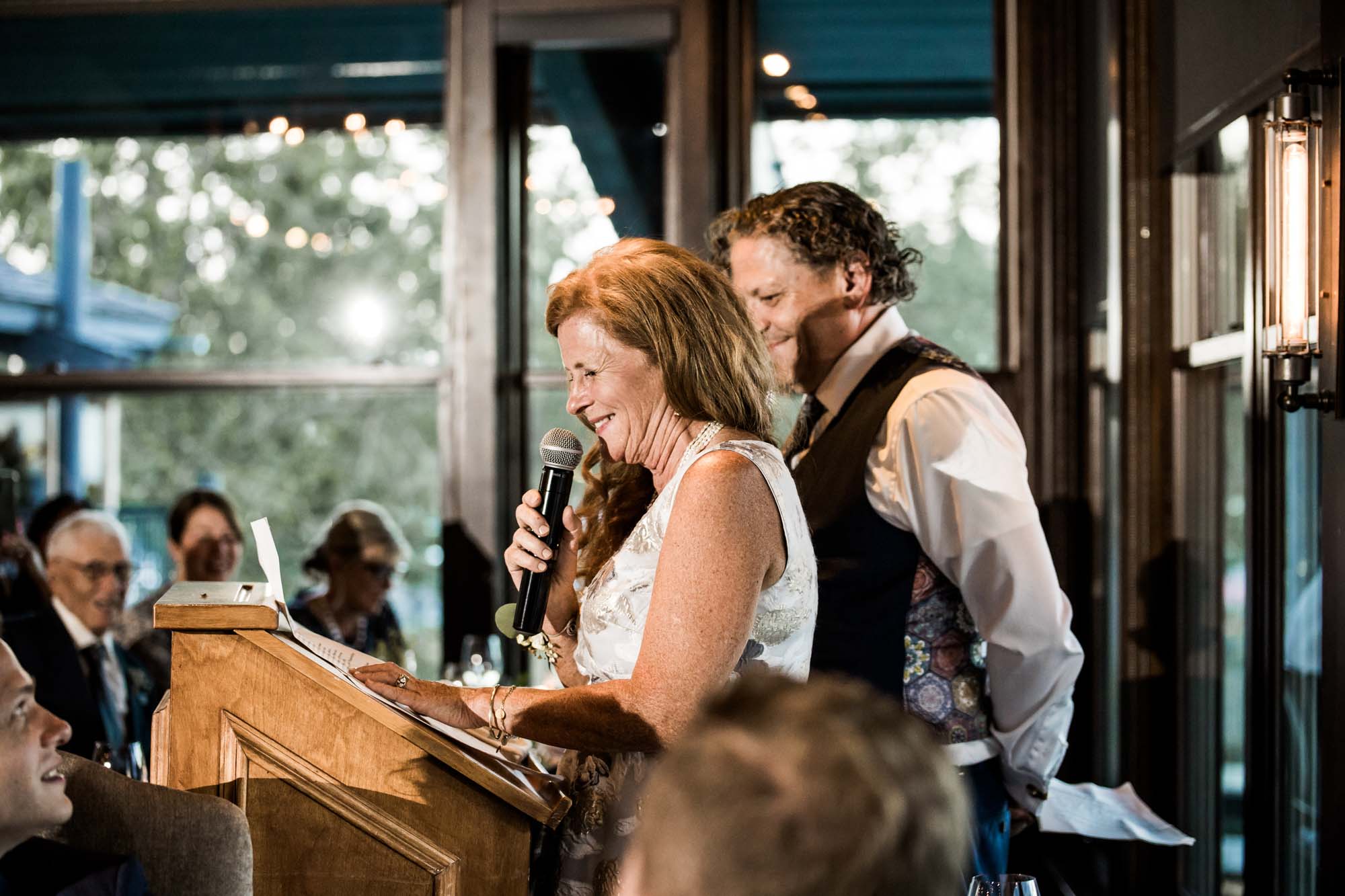 Calgary wedding photographer, summer restaurant wedding by the beach at the Lake House on Lake Bonavista