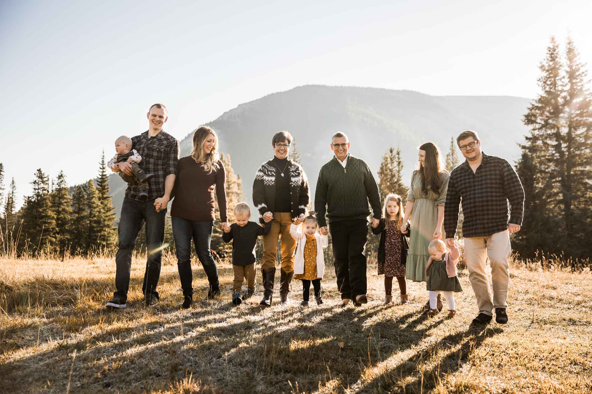 Calgary, Banff, Kananaskis lifestyle family photographer, fall family photos in front of the mountains in Kananaskis Country