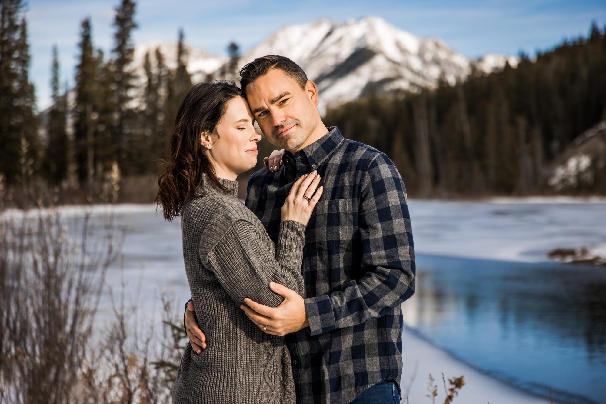 Calgary, Kananaskis, Banff wedding photographer, couple in front of the mountains in Kananaskis Country during their engagement photos
