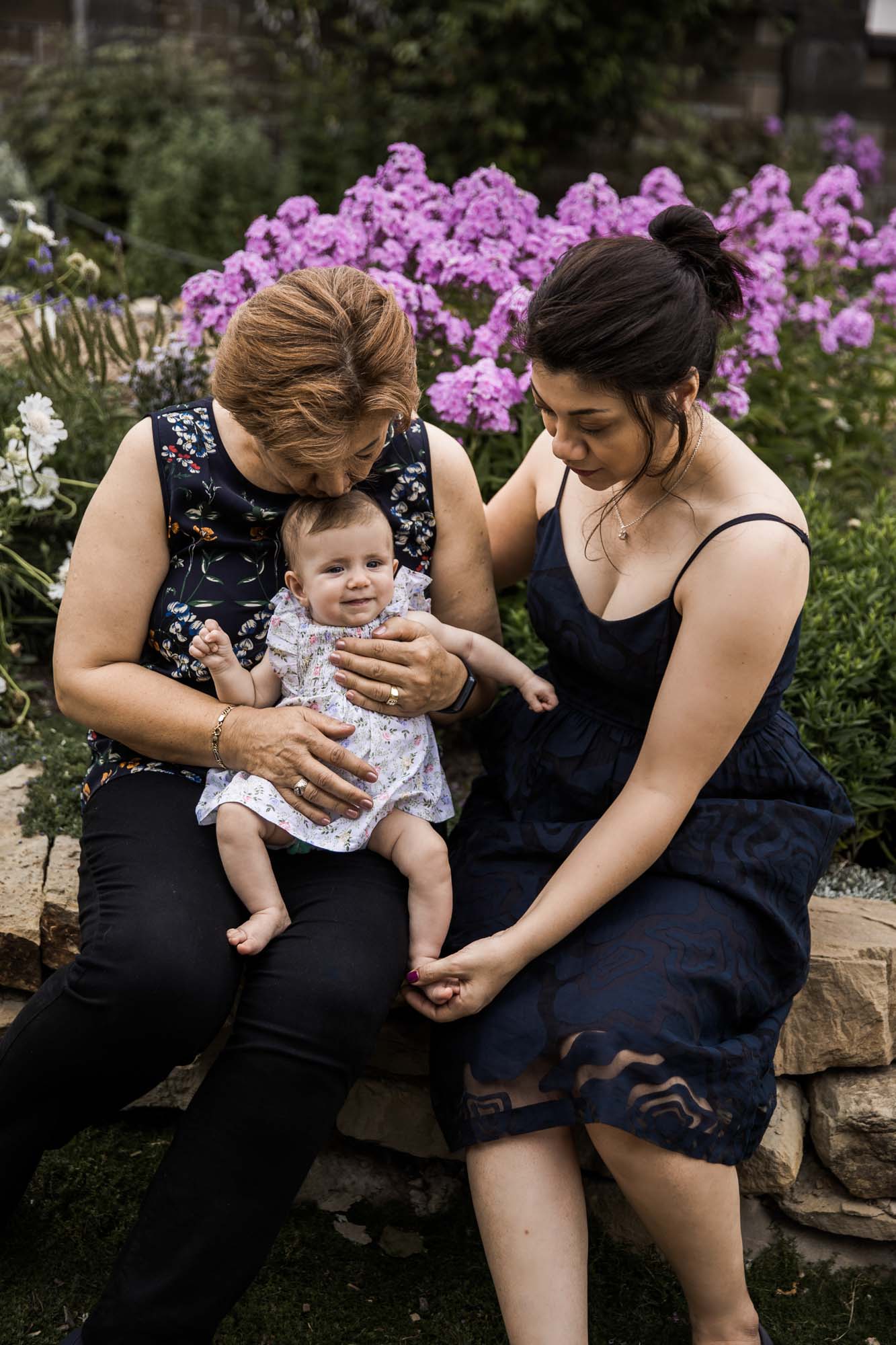 Calgary, Kananaskis, Banff lifestyle family photographer, family in front of sunflowers during their summer family photos
