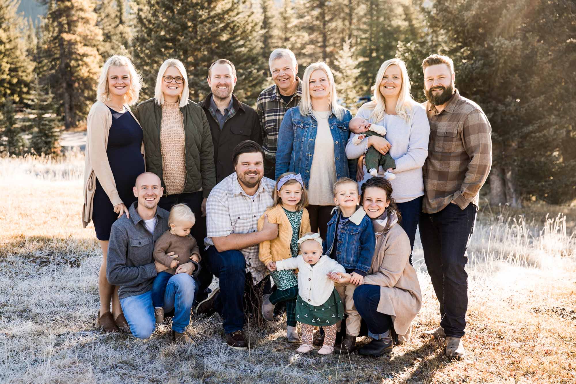 Calgary, Kananaskis, Banff lifestyle family photographer, family in front of the mountains during their fall family photos in Kananaskis Country