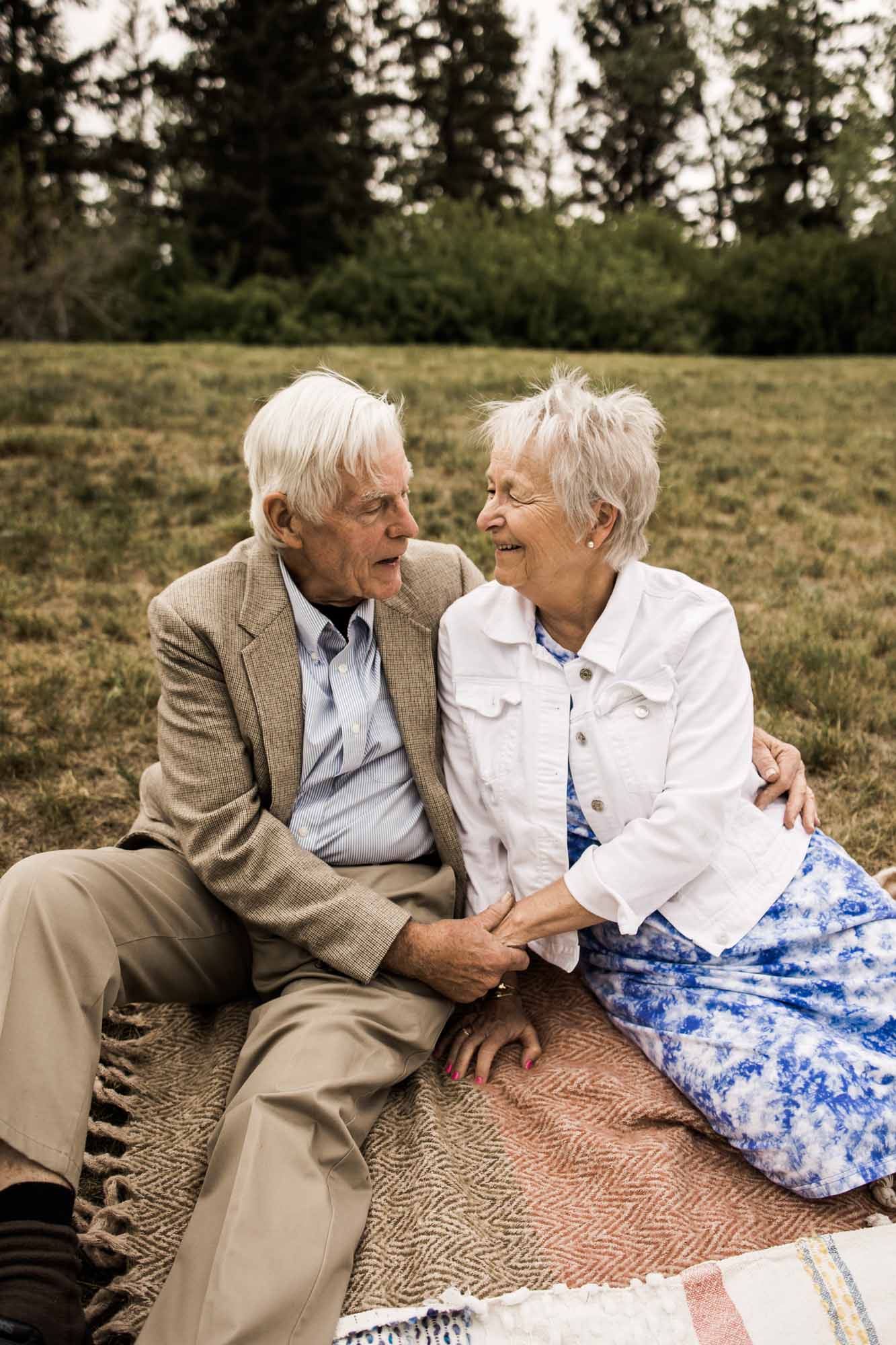 Calgary, Kananaskis, Banff lifestyle family photographer, family in front of flowers during their spring family photos
