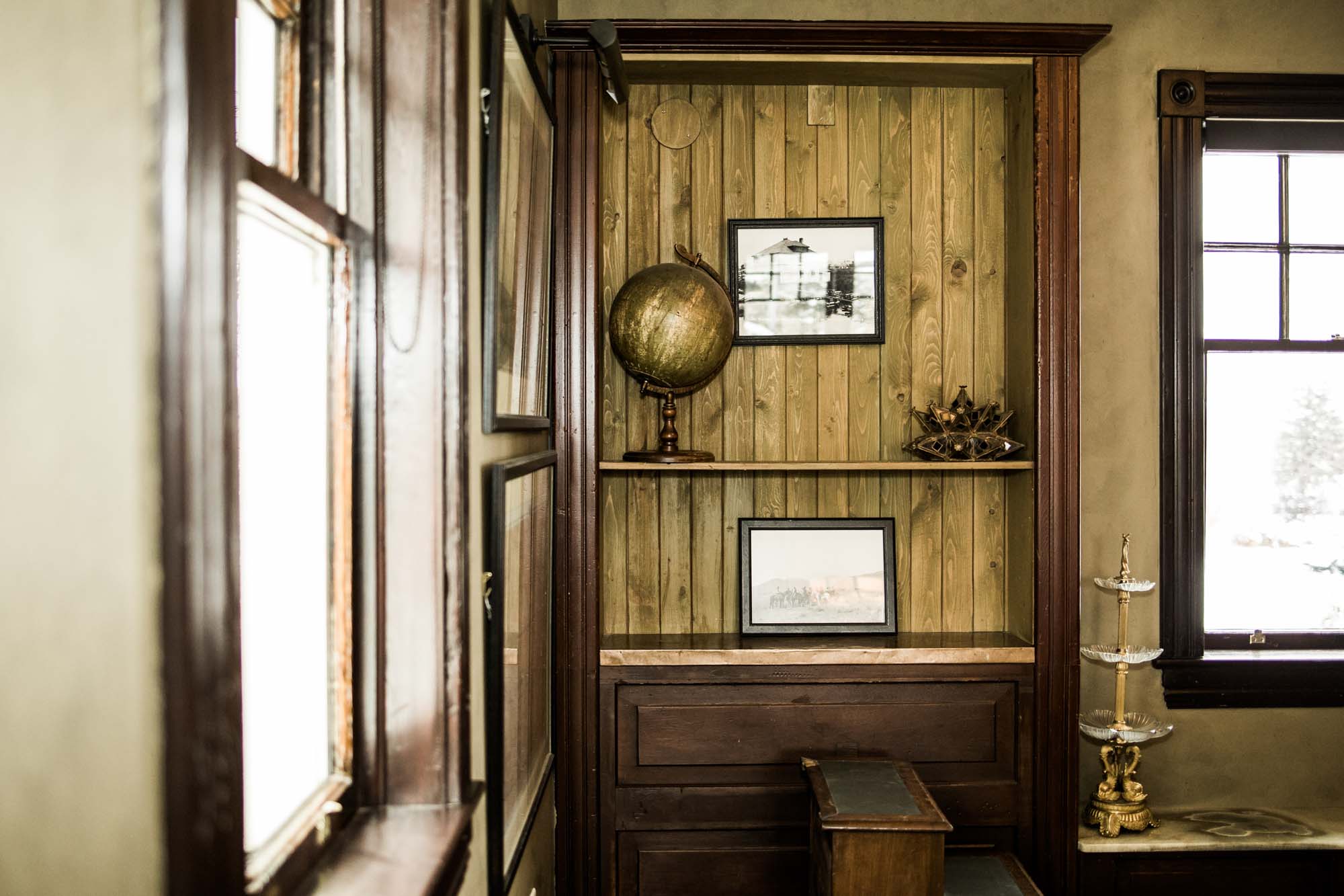 Calgary wedding photographer, bride in her dress with her bridal flowers and groom on their wedding day at Deane House Restaurant, intimate family dinner
