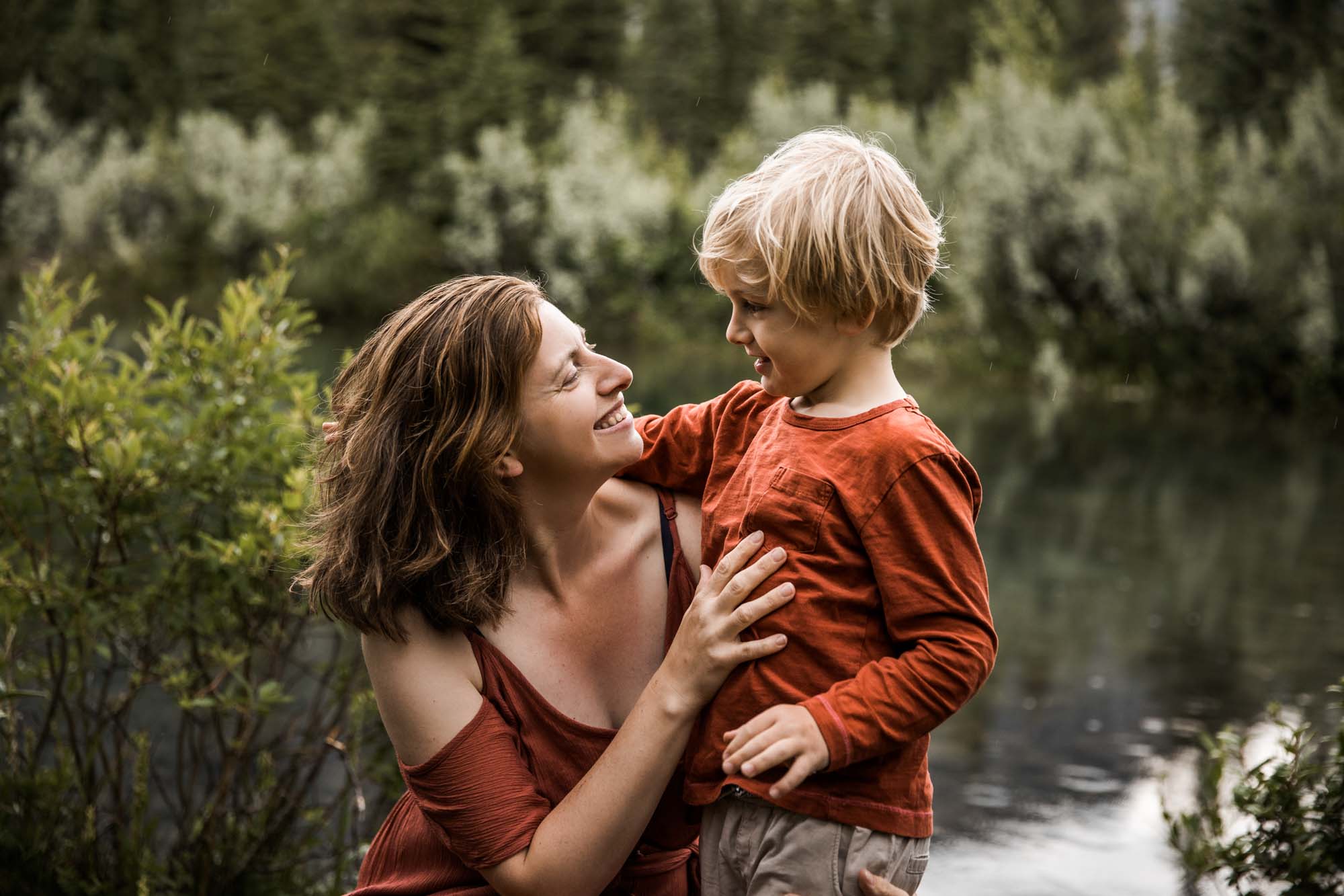 Kananaksis Country, Banff, Canmore family photographer, family photos in the mountains on a hot summer night when the rain started to pour, huge thunderstorm family shoot