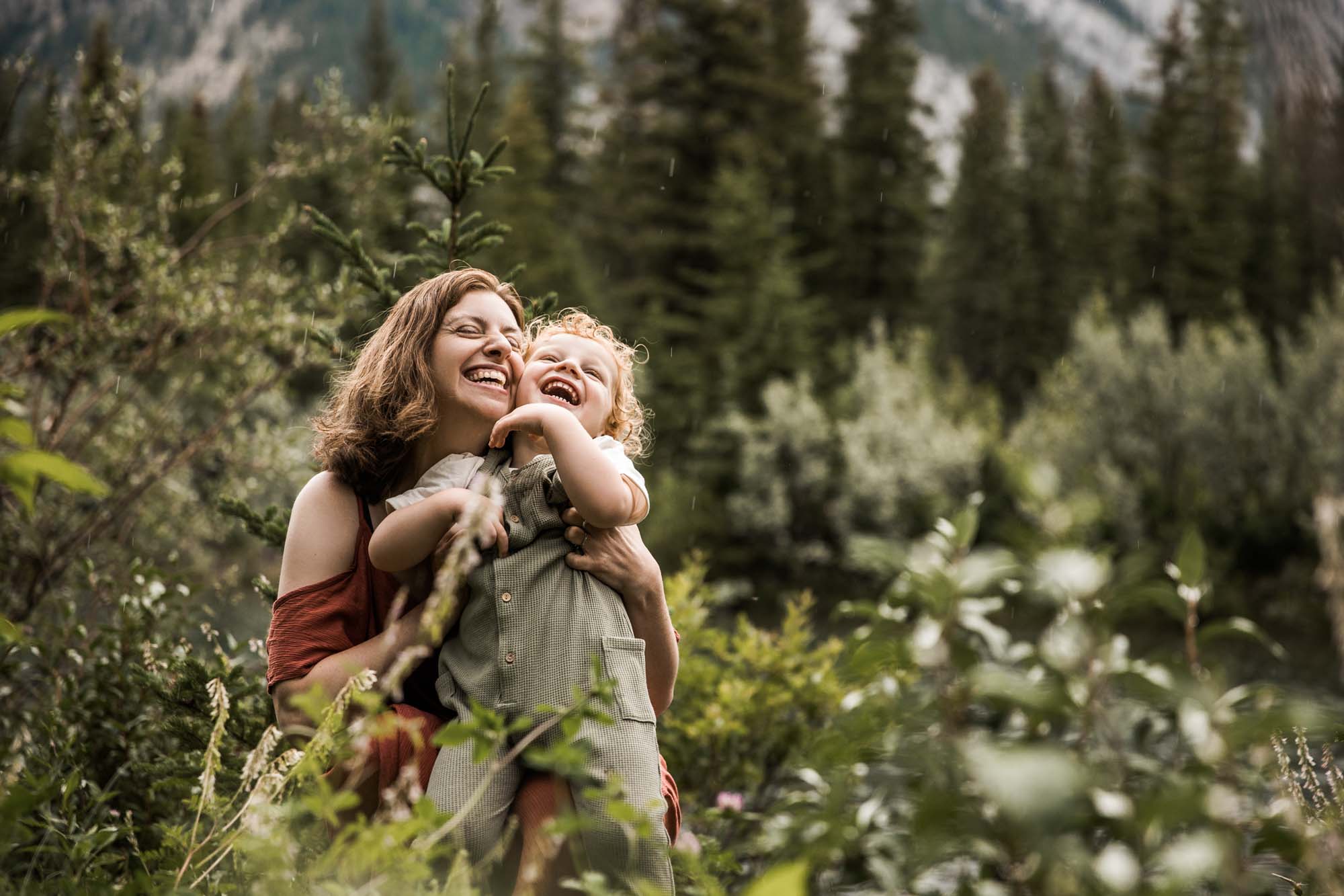 Kananaksis Country, Banff, Canmore family photographer, family photos in the mountains on a hot summer night when the rain started to pour, huge thunderstorm family shoot